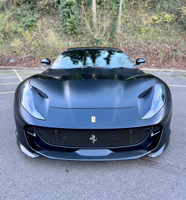 Matte black Ferrari 812 front view