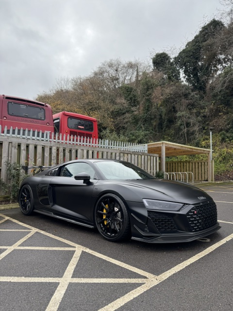 Matte black Audi R8 front three-quarter