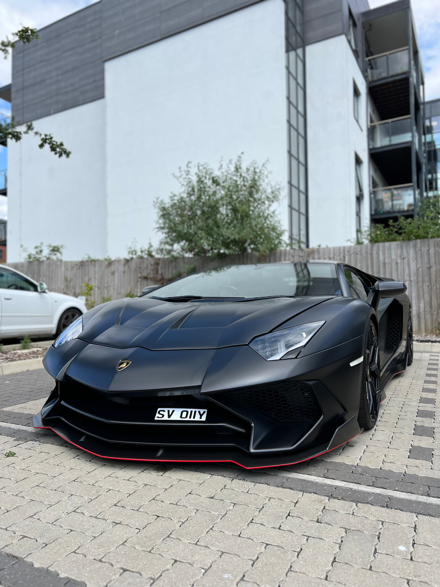 Matte black Lamborghini Aventador SV front view